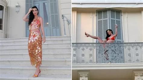 Katy Perry Poses on a Balcony in Tiny Orange Bikini